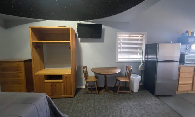 Luverne Cabin | The Galactic Getaway - Lakeside Tiny Home Rental - Queen Bed