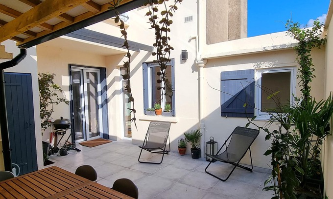 Cote Ouest Ormeaux Apartment | The hacienda - Patio Terrace - Center/Beach 5 min