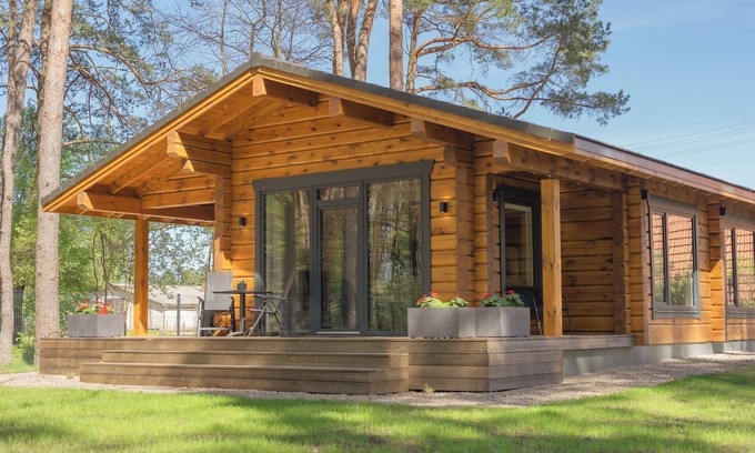 Klykiai House | The house is located in a quiet area, surrounded by forest pines.