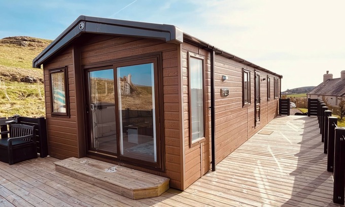 Mynytho Cottage | THE LODGE AT PENNANT-IGYN, pet friendly, with a garden in Llanbedrog