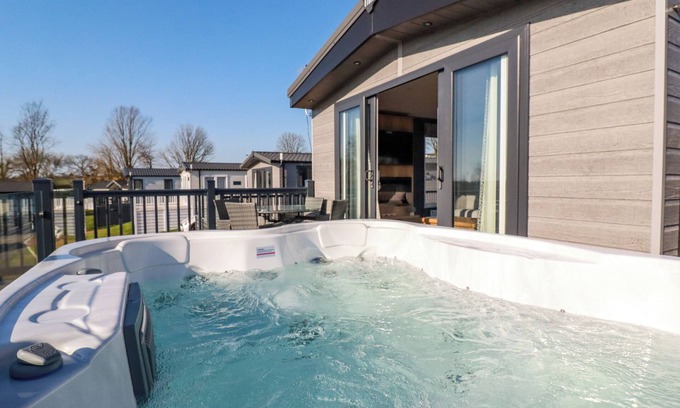 Hewas Water Cottage | THE MAPLES, NO. 48, pet friendly, with pool in Sticker