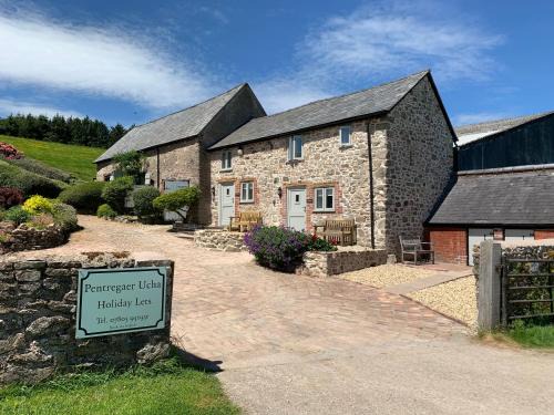 Oswestry House | The Nook at Pentregaer Ucha, with tennis court & lake.
