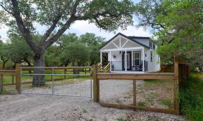 Rockport Cottage | The Rattle Trap Tiny house fenced yard