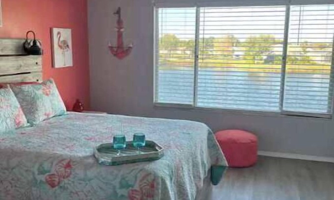 Sabal Harbour Condo | The Seabreeze Cottage with peaceful water views