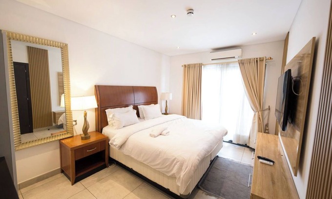 Accra Apartment | The Signature Apartment Unit A407-Charming 2-bedroom in Accra with AC, Free WiFi