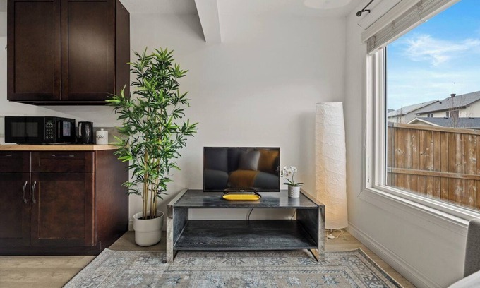 Okotoks Apartment | The Sunflower PrivateEntry PetsOK Patio TV