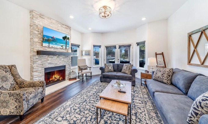 Huntington Beach House | The White House with spa, bikes and steps to the beach and down town main street shops and dining