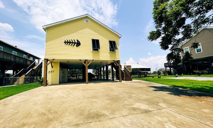 Hackberry House | "The Yellowfin" trophy speckled trout, redfish and flounder fishing.