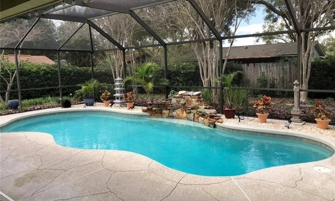 Longwood House | This Charming House with an outdoor pool, 3 bedrooms, 2 full baths.
