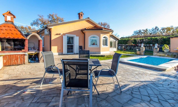 Cezarji House | This cozy vacation home with private pool is located in the small village of Pobegi, surrounded by o
