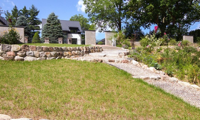 Jora Wielka House | This large and light-flooded holiday home welcomes you on a beautiful lakeside plot.
