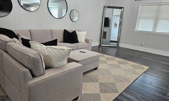 Odessa House | This modern 4-Bedroom features a spacious interior and exquisite backyard.