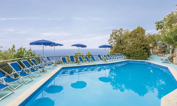 Monte Chiaro Apartment | This modern bungalow belongs to a vacation home complex directly above the sea, with a unique panora