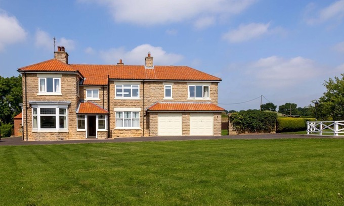 Darlington Cottage | This property is in a stunning location, it boasts a private hot tub and games rooms.