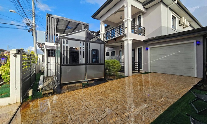 Claxton Bay Apartment | This spacious studio features a fully equipped kitchen, and an inviting small pool