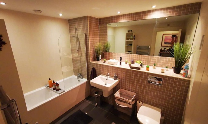 Ormeau Apartment | This stylish place to stay is perfect for families with a huge living space and big bedrooms