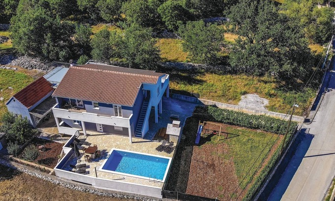 Primorski Dolac House | This vacation home with pool is located in a peaceful environment.