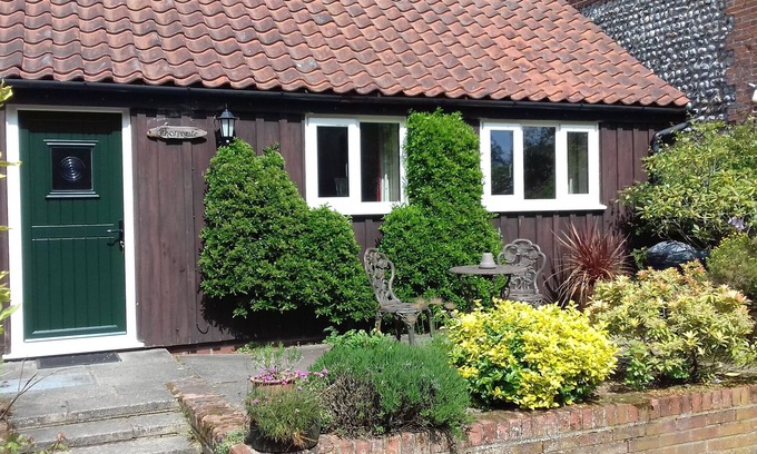Thorpe Market Cottage | Thorpegate Cottage - Set Around An Old Farmyard In A Village Location