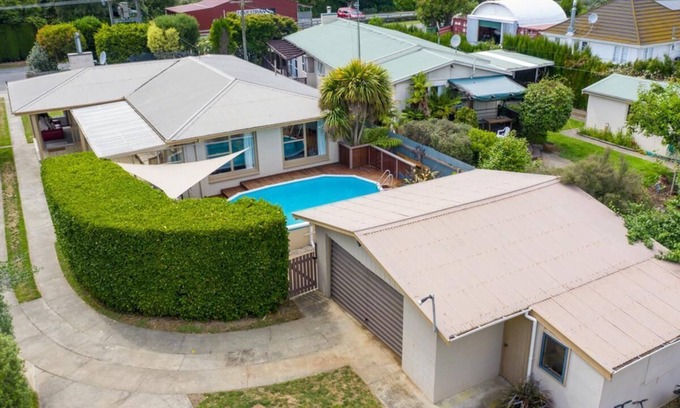 Blenheim House | Three Bedroom Home with a Pool & Fireplace