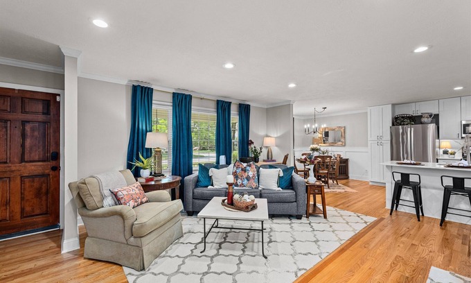 Martinez House | Three bedroom two bath with fenced yard and 2 car garage. The sleeping arrangements for this property are 3 queen beds.