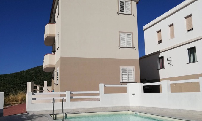 Badesi Apartment | Three-room sea-view apartment with pool in Badesi