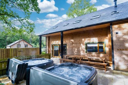 Farley House | Throwley, woodland lodge with hot tubs for 14