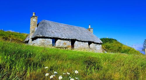 Sleat House | Tigh Lachie, Mary's Thatched Cottages, Elgol, Isle of Skye