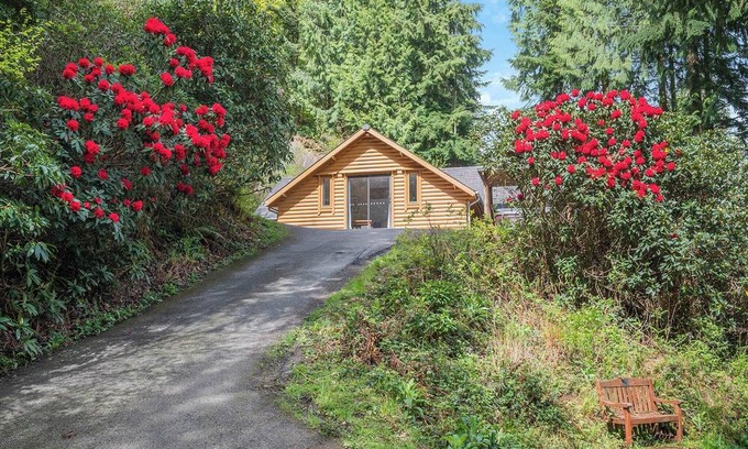 Westleigh Ski Chalet | Timber lodge set in an elevated position with views of the lakes.