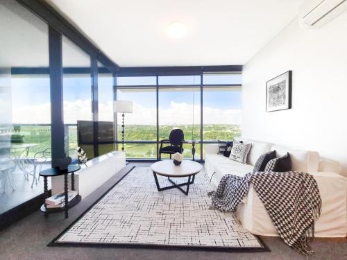 Sydney Olympic Park Apartment | Timeless Black n White Charm 2BR w Kids room
