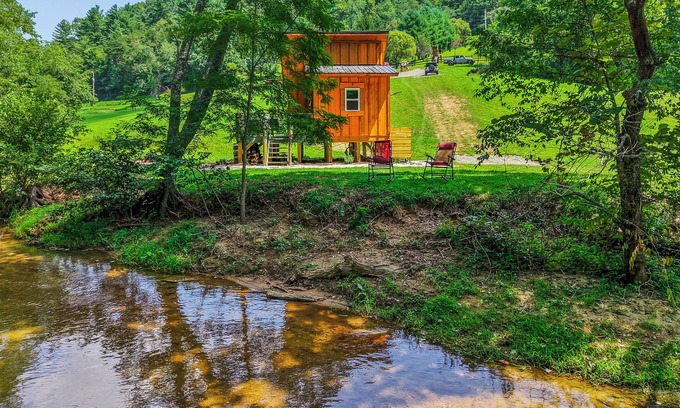 Hillsville Cabin | Tiny cabin sits by the bubbling, stocked creek. Pet friendly