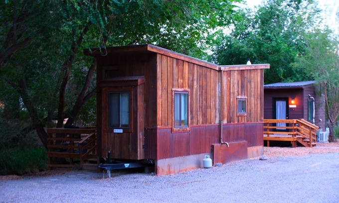 Montrose House | Tiny home located beside a creek.