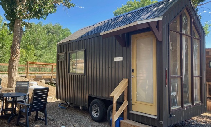 Montrose House | Tiny home with one lofted queen bed and full size futon.