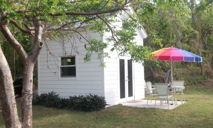 Dunmore Town House | Tiny House Vacation, Bayfront with private beach area! On two secluded acres!
