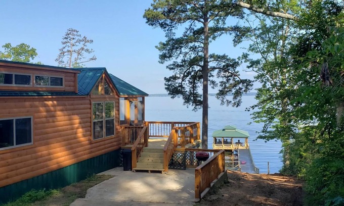 Negreet Cabin | Tiny Toledo - Lakefront Cabin with Boathouse, Fishing Pier, and DRAMATIC Sunsets