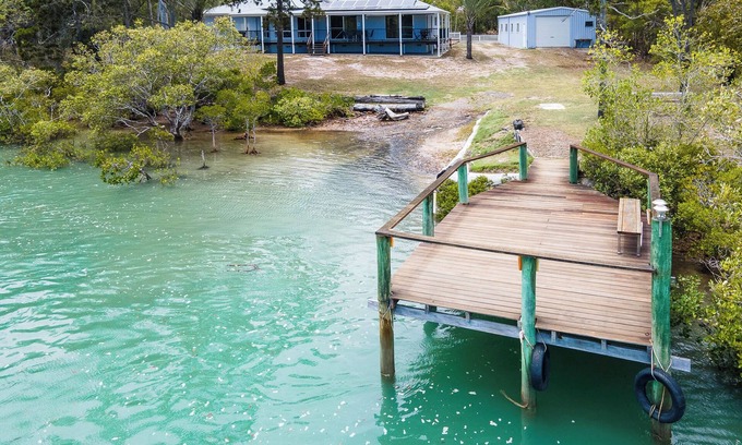 Toogoom House | Toogoom Retreat - Absolute Riverfront - Sleeps 6-8 - Boat Ramp - Wi-Fi - Pets