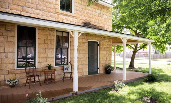 Hays Apartment | Top Floor Historic Limestone Property Downtown