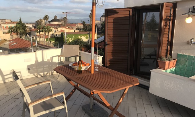 Oristano Apartment | Top floor small loft overlooking the old town near to the beach