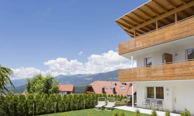 Riscone Apartment | TOP vacation apartment with garden & terrace, bike room, garage, Cron 4 sauna & pool