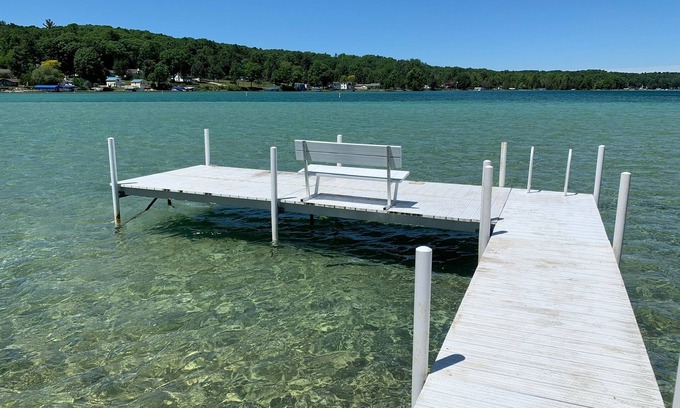 Rapid City House | Torch Lake Oasis: Serene Views & Waterfront Bliss Await!