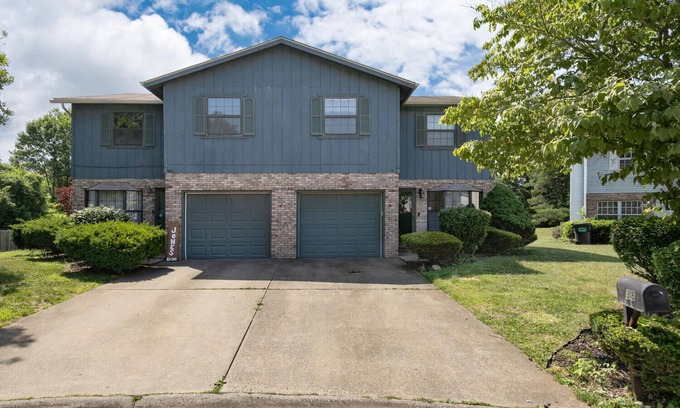 Collinsville House | Touch of Class 3-bedroom townhome in Belleville King Bedroom.