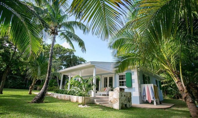 Dunmore Town Cottage | Touchstone's Cottage on Beachside - Tropical 1 Acre Property