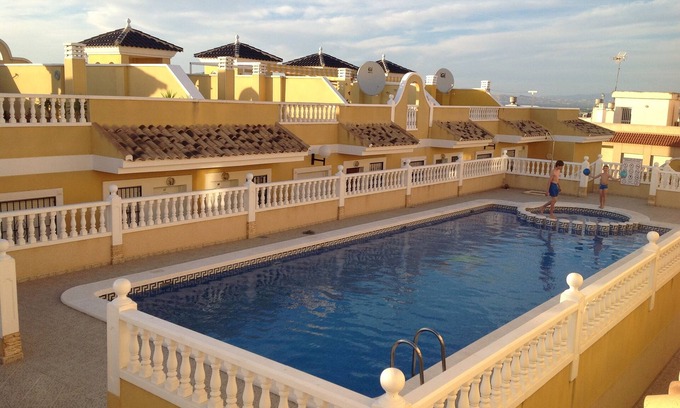 Benijofar Villa | Townhouse in Benijofar with very large, shared pool FREE Wi-Fi & English TV