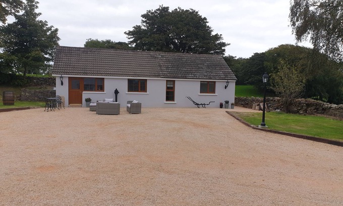 Downpatrick Cottage | Traditional Irish cottage with views of Slieve Patrick
