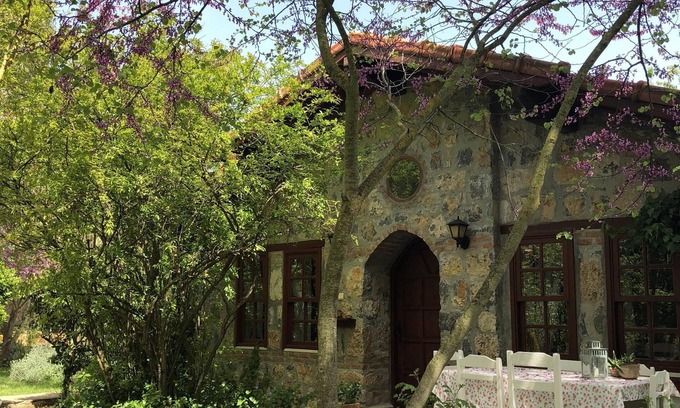 Kayakoy Cottage | Traditional stone cottage with stunning garden in historic Kaya village.