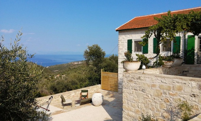 Kourteika Villa | Traditional stone house with unique sea views