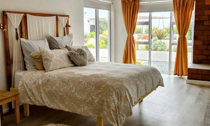 Grotto Bay House | Tranquil, family friendly West Coast vacation home in a private nature reserve