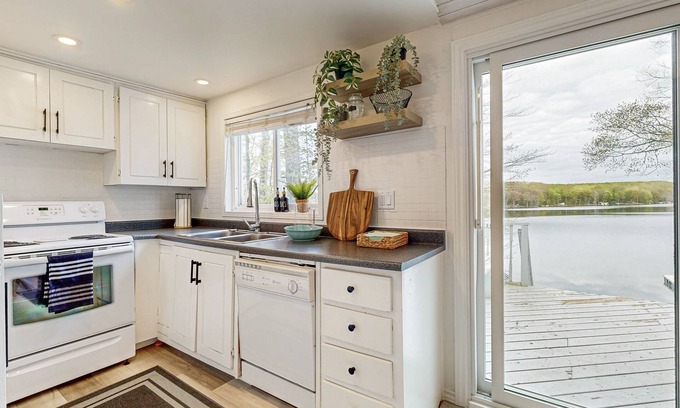 Tiny Cottage | Tranquil lakeside cottage with modern comforts, waterfront views & outdoor fun