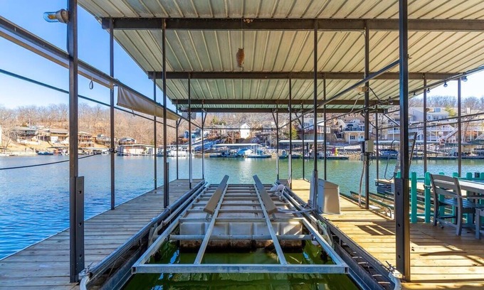 Lake Ozark House | Tranquil Lakeside Retreat: Private Boat Slip and Dock Included