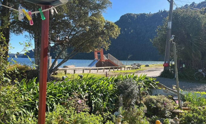 Rototai House | Tranquil Retreat with Breathtaking Lake Views: Renowed for Trout Fishing