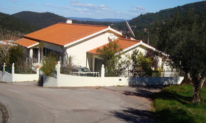 Penela House | Tranquil setting in private gardens with heated pool, BBQ annex and Games room.